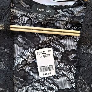 Le chateau black lace shrug. Size M. New